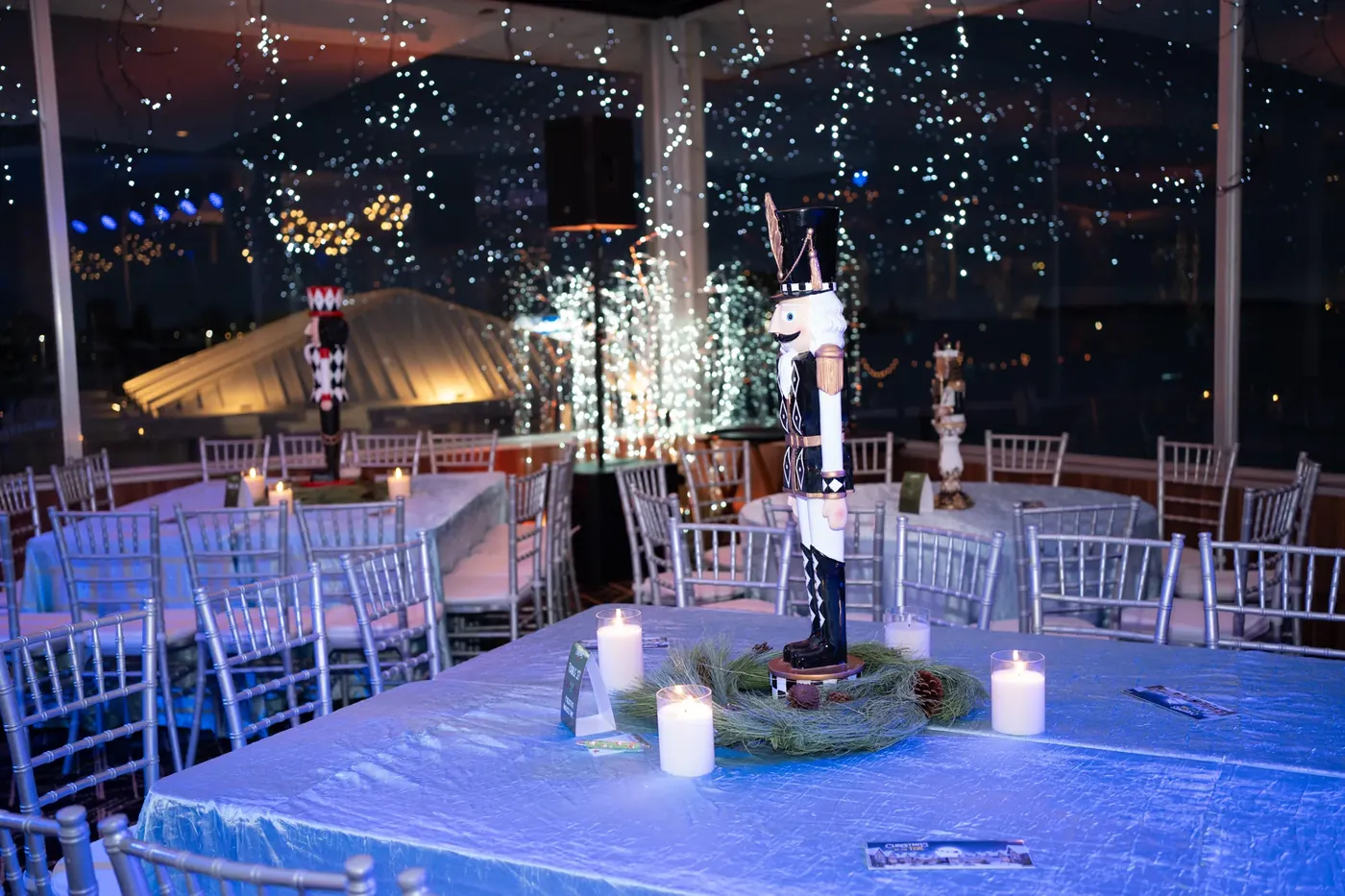 Table settings by the glass wall
