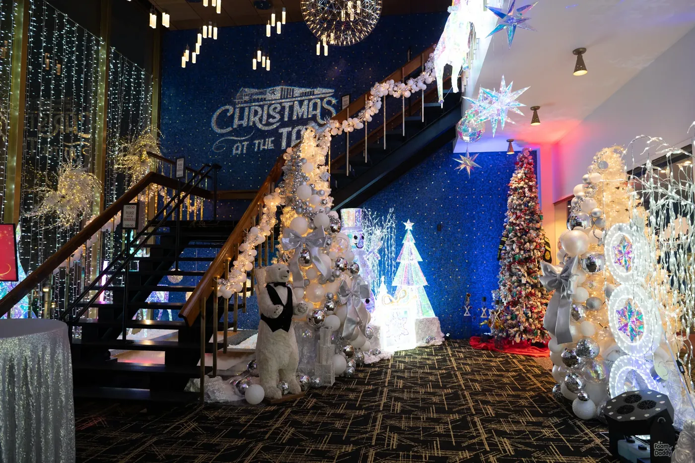 The grand staircase in white lights