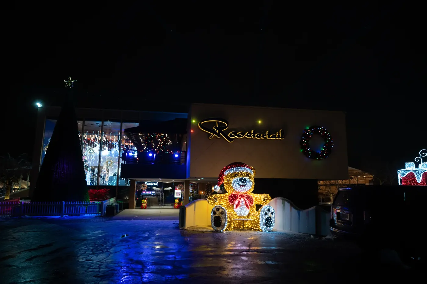 The Roostertail lit up at night