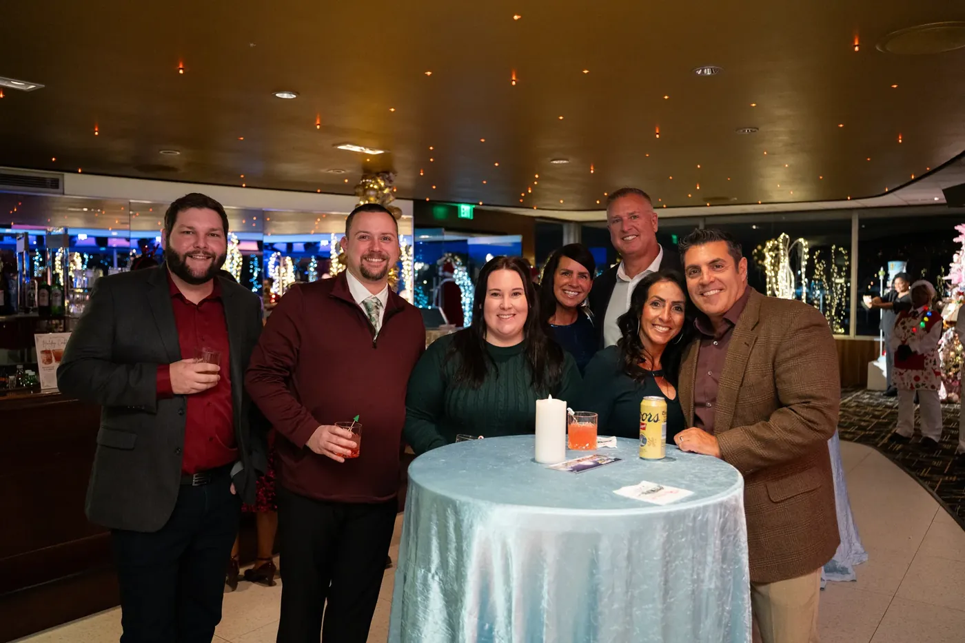 Coworkers at a cocktail table