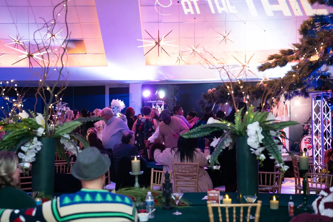 Packed dining room under the sign
