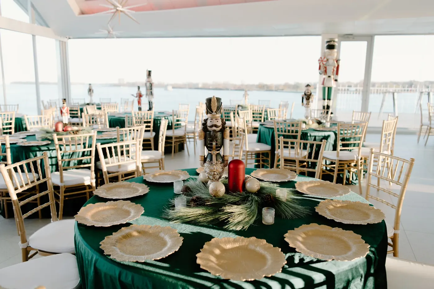 Green and gold table settings on the river