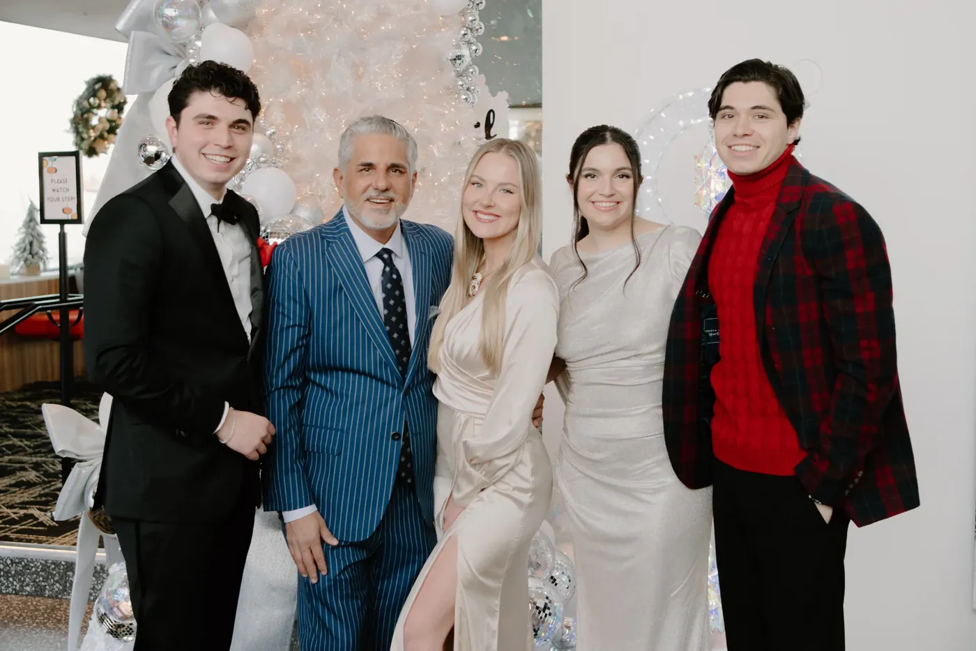Well-dressed crew at the entrance